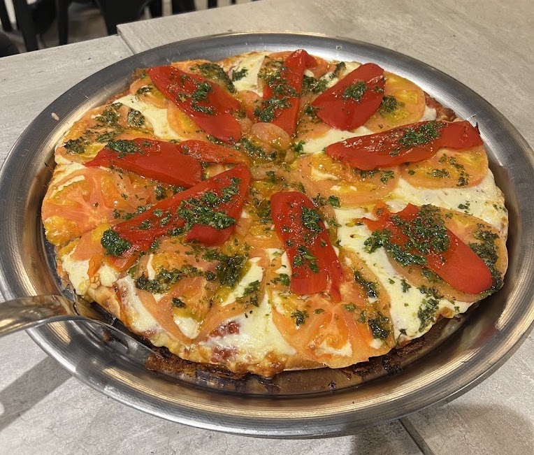 Pizzería y bodegón trasandino en pleno Parque Bustamante